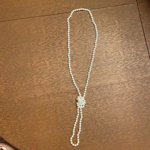 3/$15 or $7 Pearl necklace (costume jewelry).